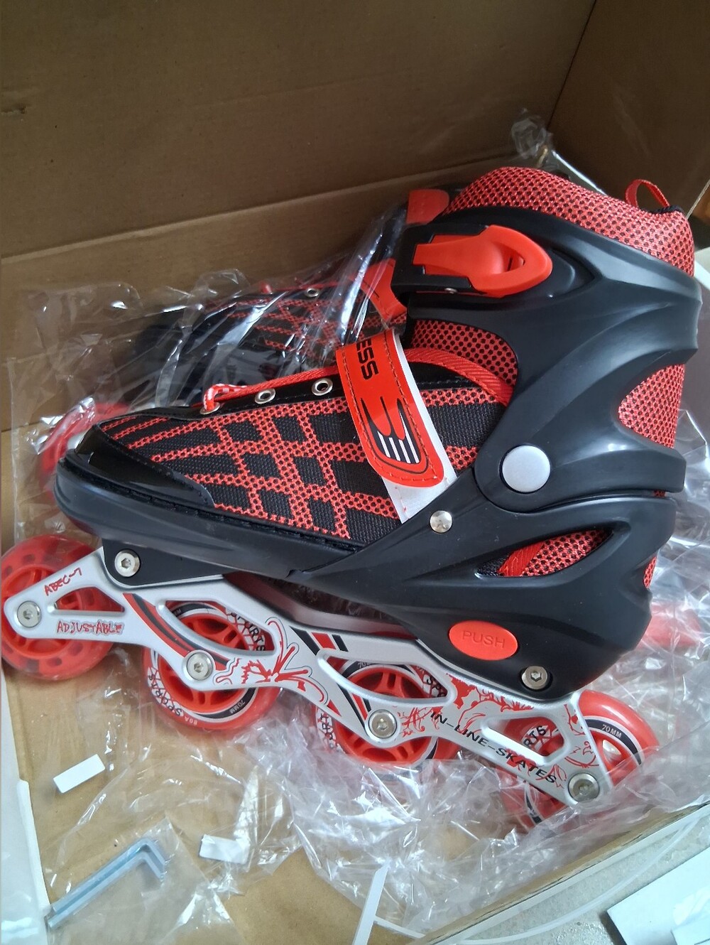 NIB-Youth Red and Black Adjustable Inline Roller Skates